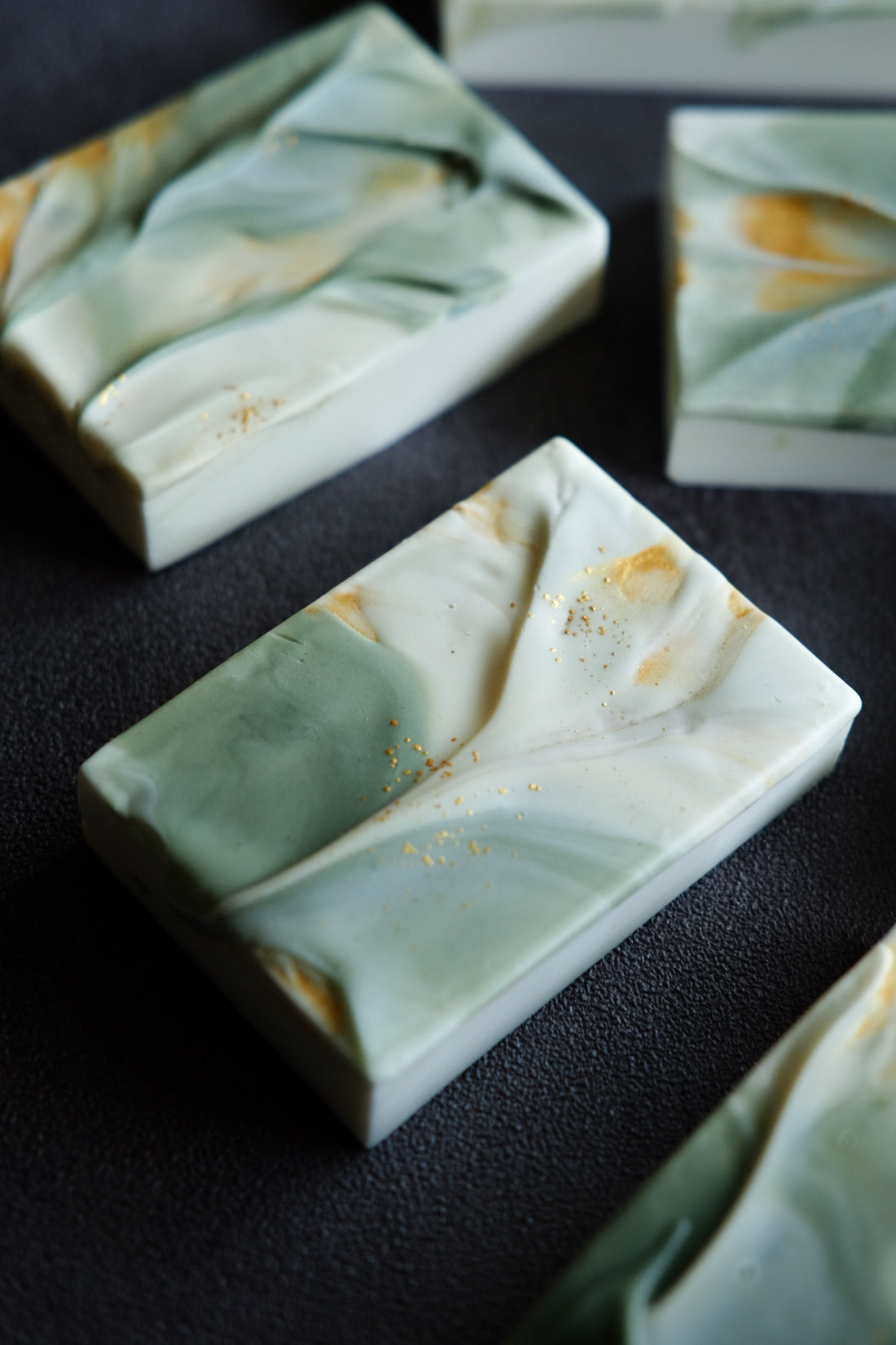 Artisan mineral-inspired soap with soft green marble tones