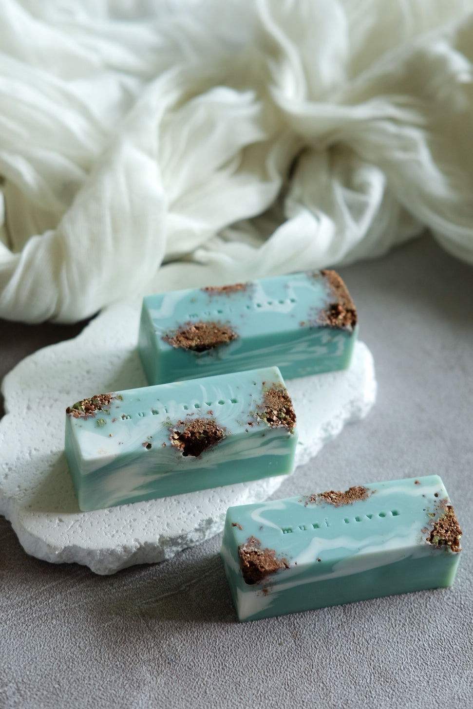 Artisan cold process soap inspired by mineral textures and fluid patterns