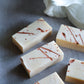 Handmade minimalist cold process soap with copper splash details