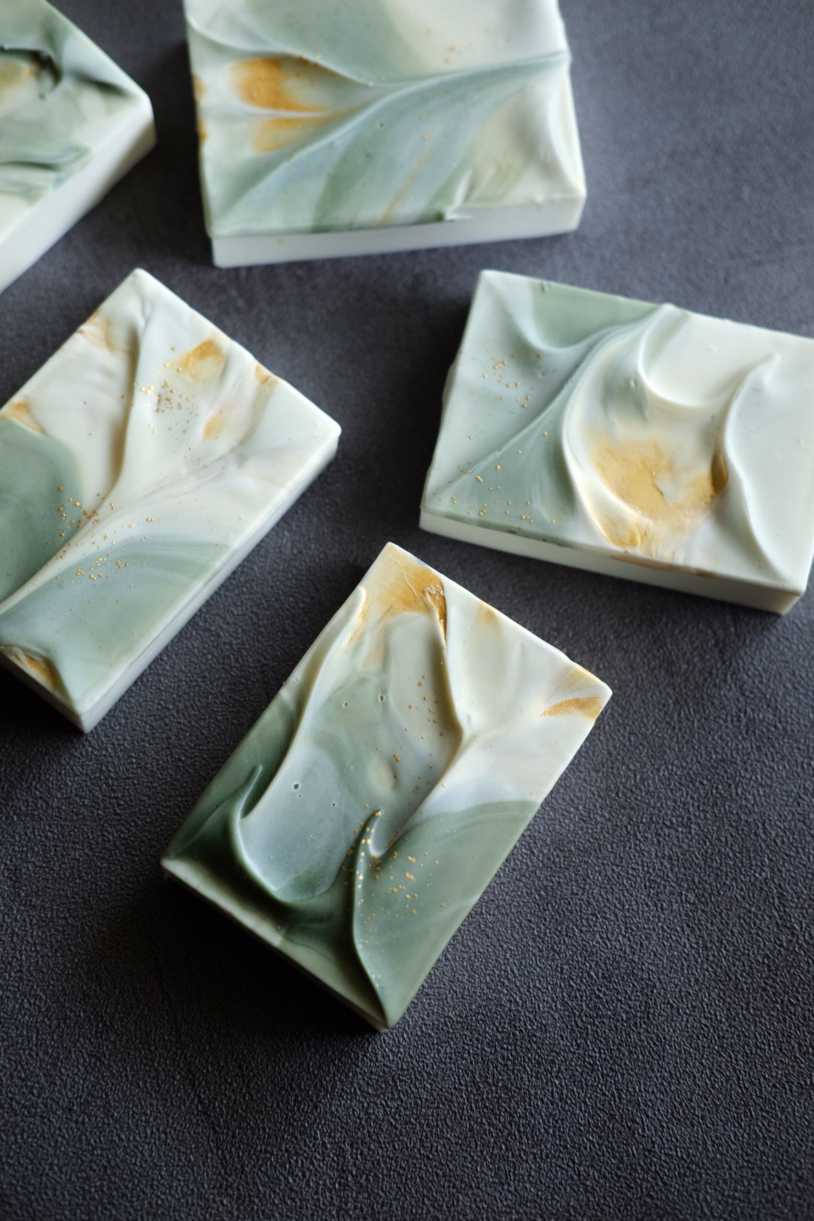 Handmade artisan soap with sculptural folds and soft mineral textures