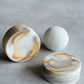Handcrafted lemongrass soap with sculptural marble-like surface