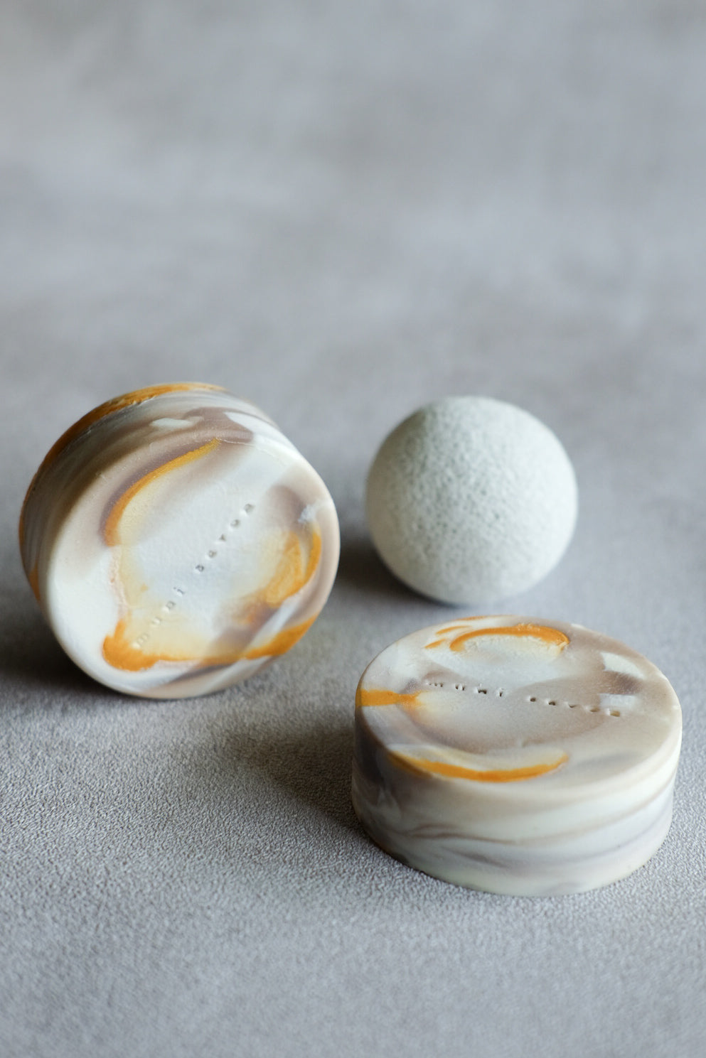 Handcrafted lemongrass soap with sculptural marble-like surface