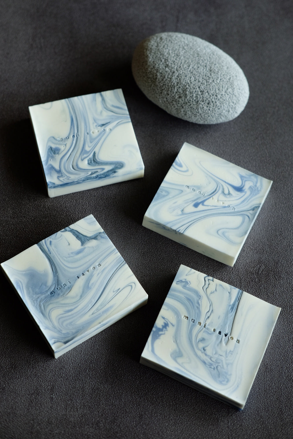 Handmade artisan soap with blue marble textures and minimalist design