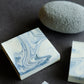 Minimalist handcrafted soap with soft blue swirl details