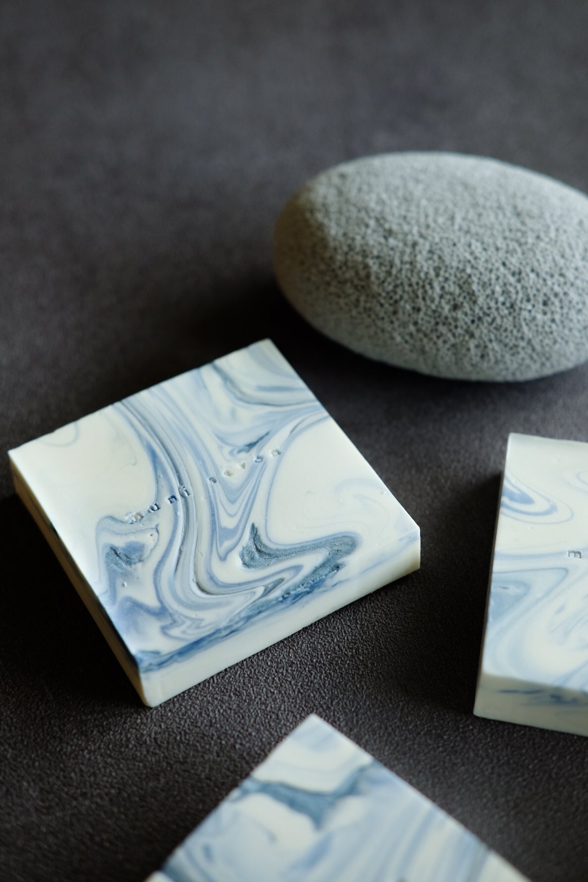 Minimalist handcrafted soap with soft blue swirl details