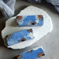 Minimalist artisan soap with copper foil details and marble texture