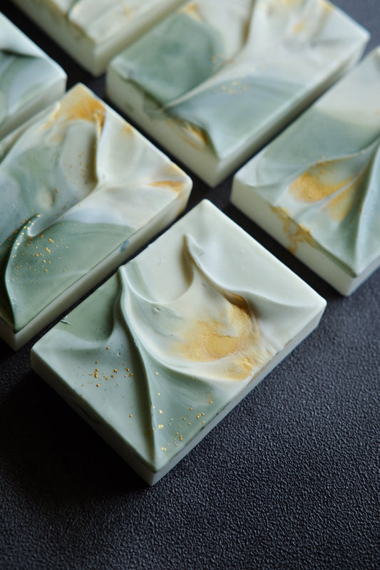 Minimalist cold process soap inspired by layered sculptural forms
